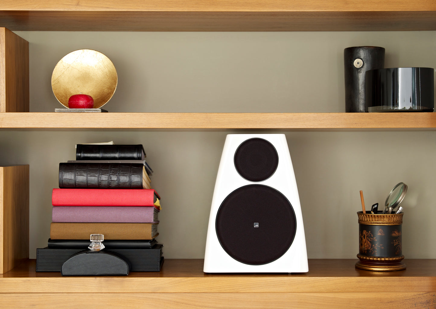 Lifestyle Image of the Meridian DSP3200 Speakers in Gloss White