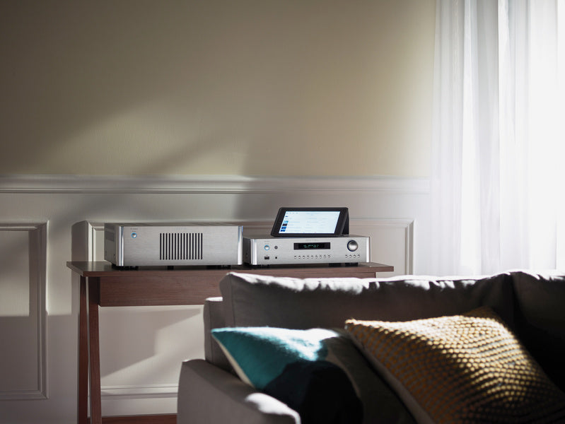 Lifestyle Image of the Rotel RB-1552 Stereo Power Amplifier in Silver