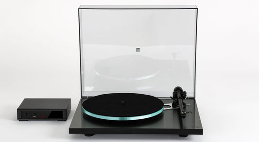 An image of the Rega Planar 3 RS Edition with a Rega Neo Mk2 power supply to the left of it