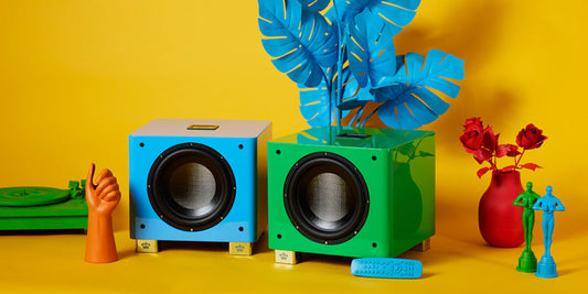 An image depicting the REL T/9x in French Racing Blue on the left and Green With Envy on the right