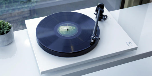 An image of a white Rega Planar 1 Plus