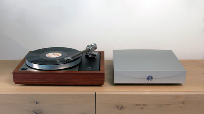 Lifestyle Image of the Linn Klimax Radikal LP12 Power Supply in Silver