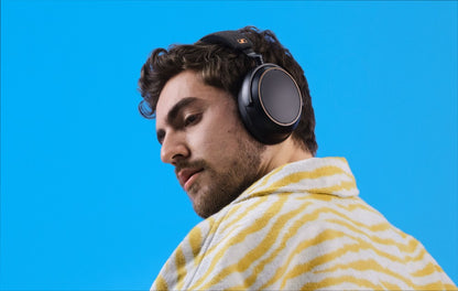 Lifestyle Image of the Sennheiser Momentum 4 Wireless Headphones in Black