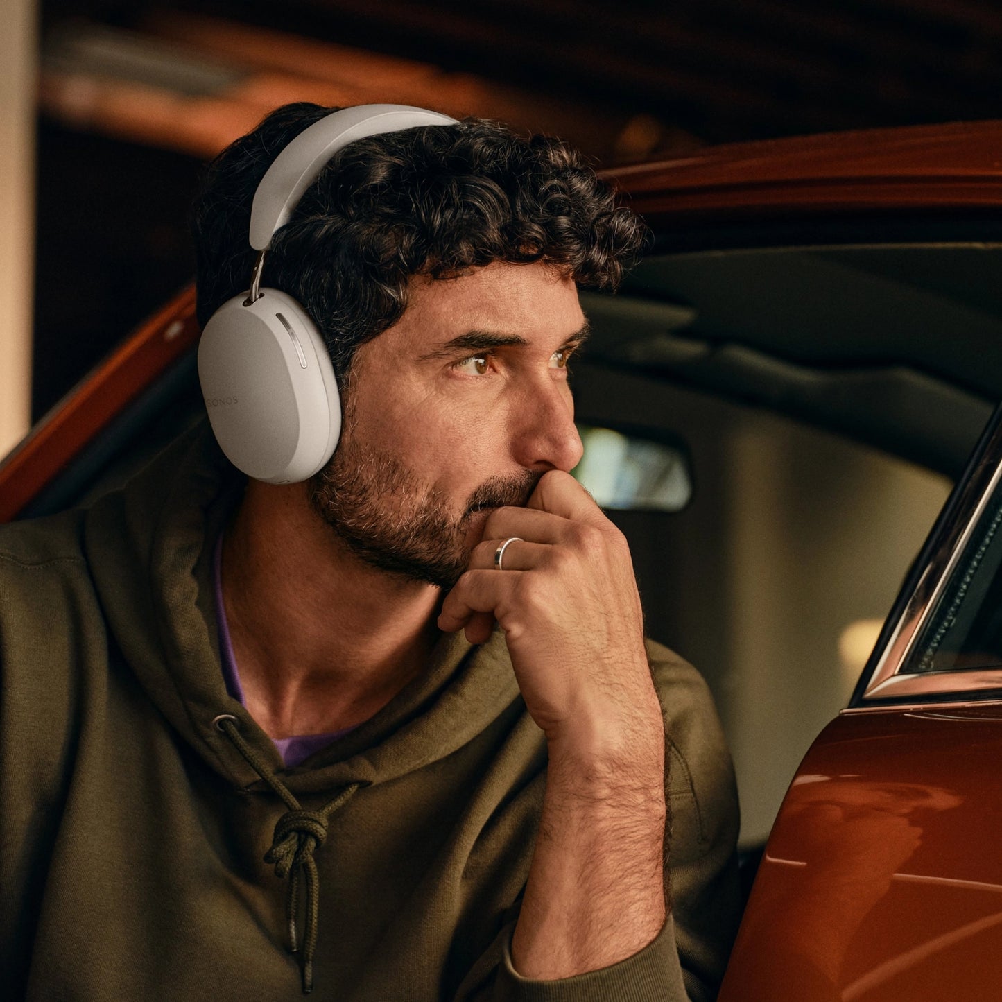 Lifestyle image of Sonos Ace Headphones in white.