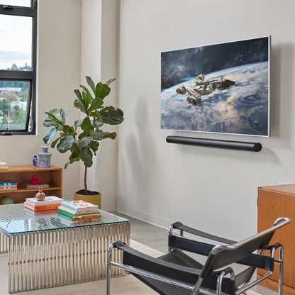 Lifestyle image for a Sonos Arc Ultra soundbar in black.